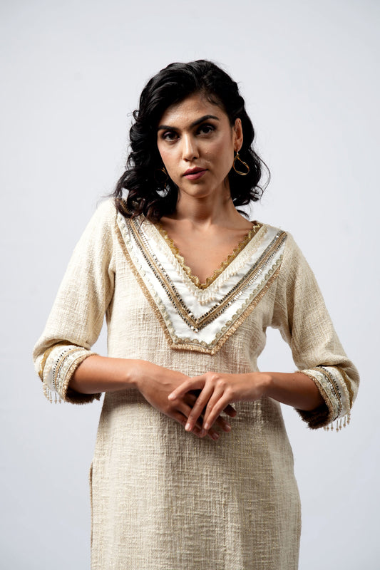 Glistening off-white and Golden Detailing Kurta Set